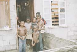 Six of Clyde Watsonxs nine children at their Kuru Kuru home yesterday, just after learning that their father had been shot. (Picture by Cullen Bess Nelson)